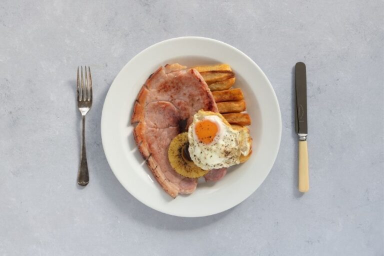 Cookedham steak, with fried egg, chips and pineapple!